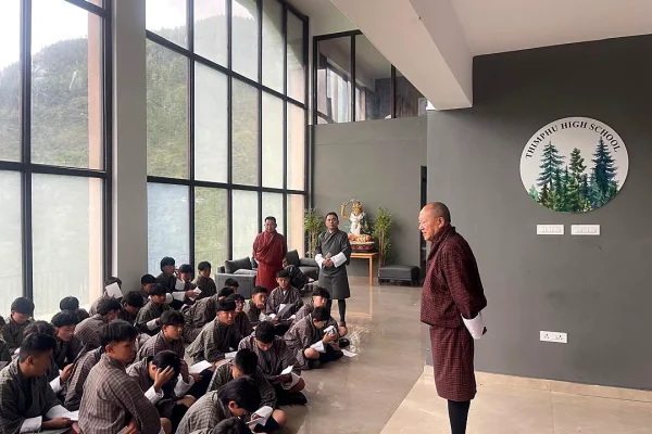 Principal meeting students